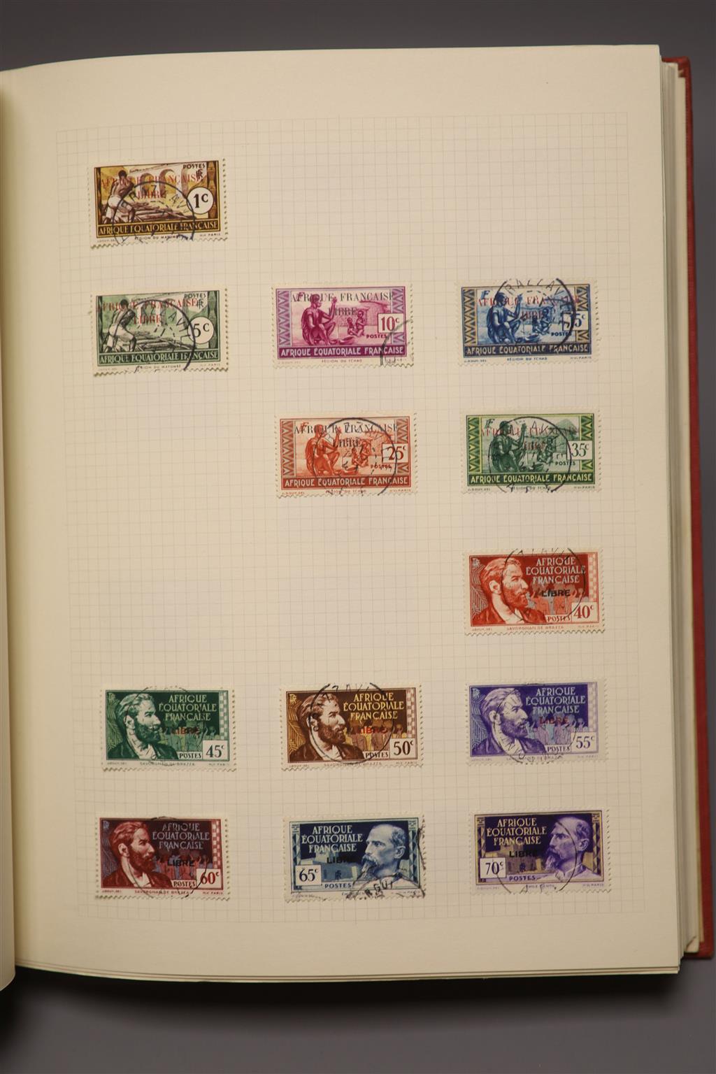 A Stanley Gibbons red stamp album and two others, each mounted with an accumulation of all world postage stamps